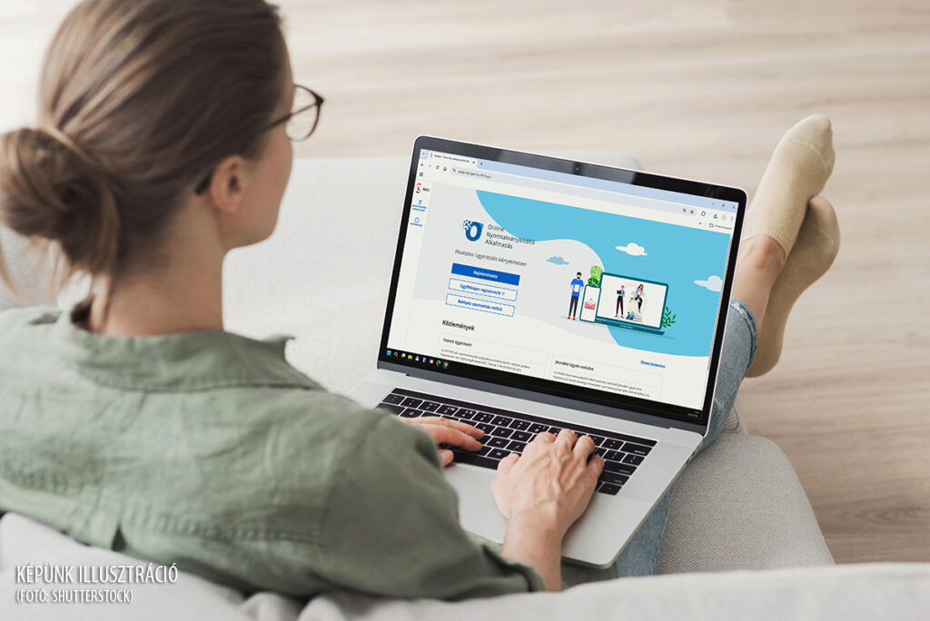 Young woman working at home, using laptop computer with blank white screen display mockup. Student girl looking at laptop screen